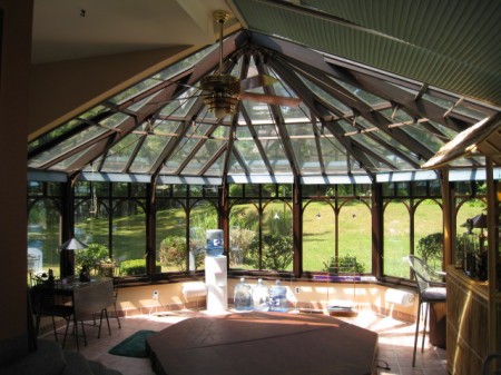 Wood interior conservatory with aluminum exterior